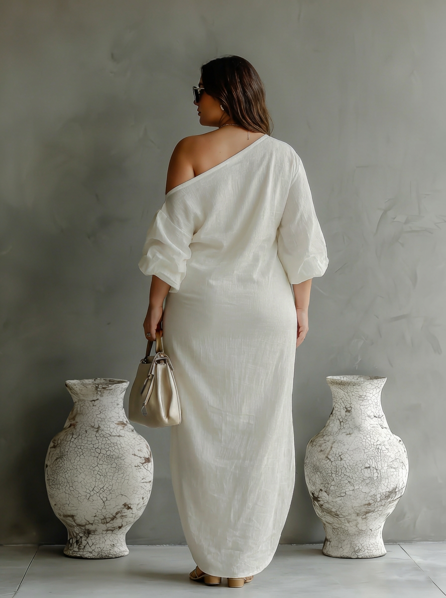 Elegant Flödande Klänning i Elfenben Vitt med Off-Shoulder
