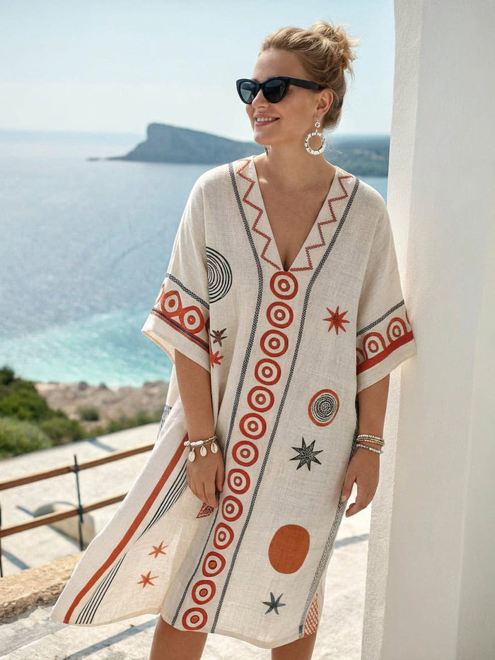 Mika | Kustgeometrisk broderad miniklänning