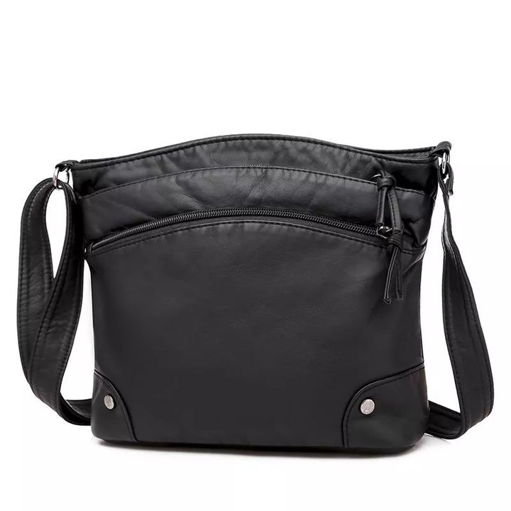 Romilly - Crossbody Läderväska