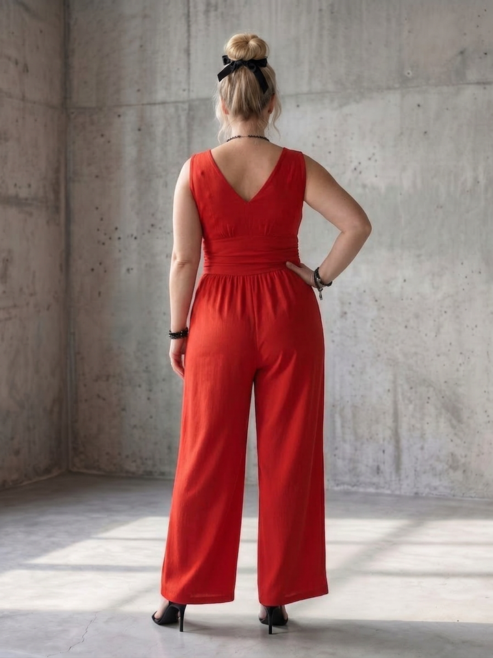 Tegan | Djup V-midja Definierad Vida Byxor Jumpsuit