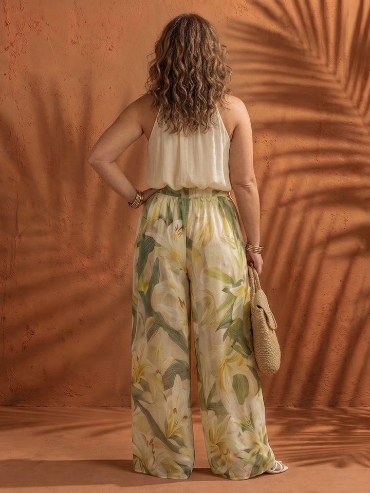 Ila | Halterneck Blus Blommig Vida Byxor Set