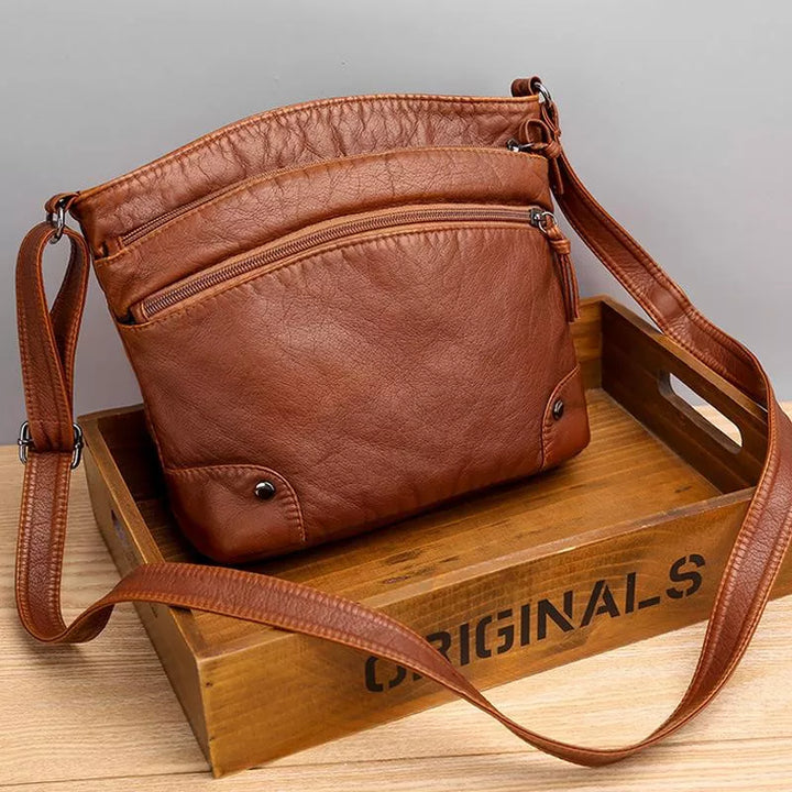 Romilly - Crossbody Läderväska