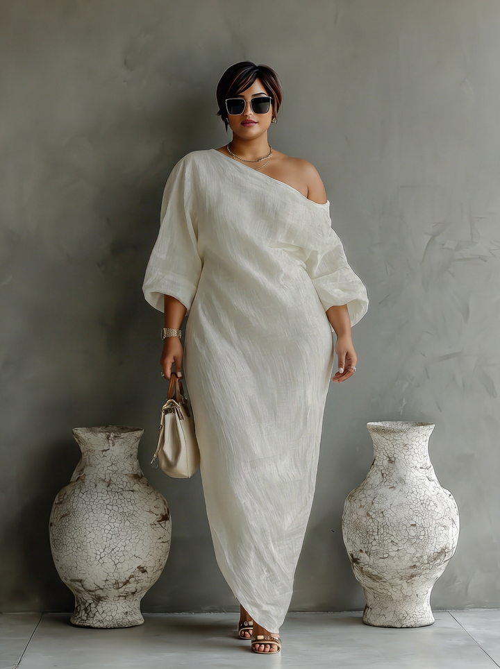 Elegant Flödande Klänning i Elfenben Vitt med Off-Shoulder