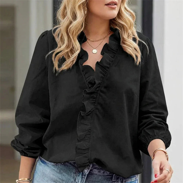 Magnolia | Feminin Blus med Lekfulla Volanger