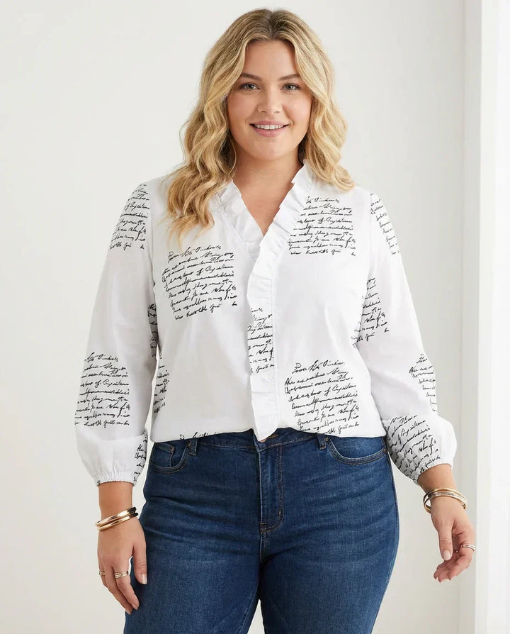 Magnolia | Feminin Blus med Lekfulla Volanger