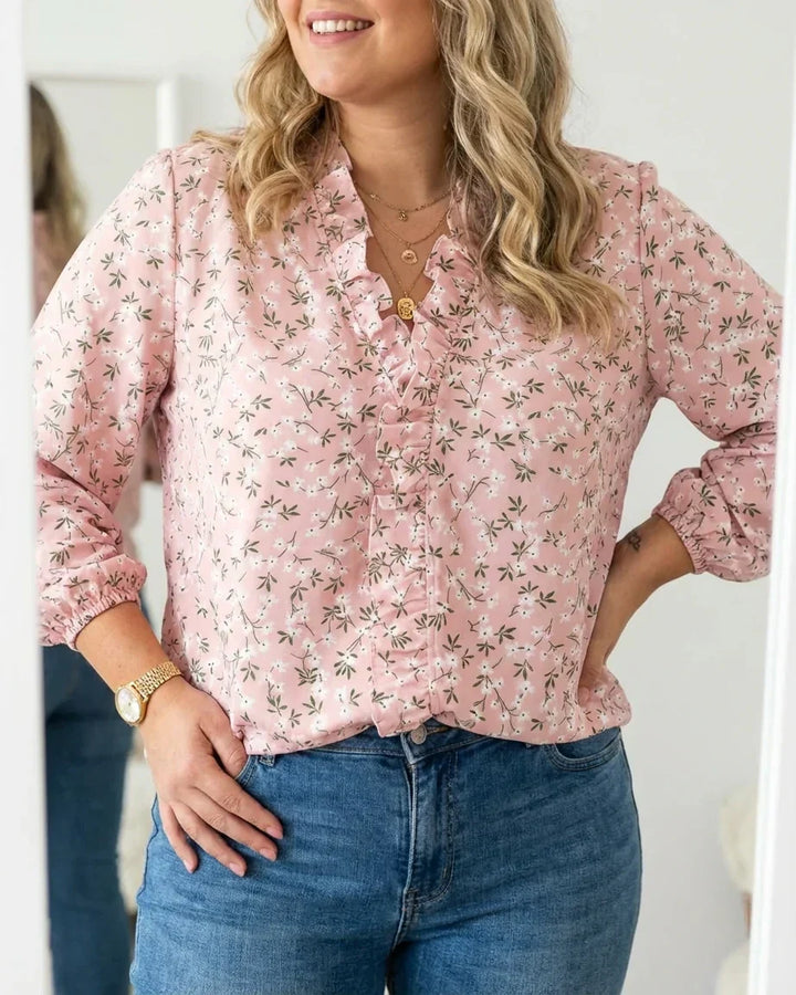 Magnolia | Feminin Blus med Lekfulla Volanger