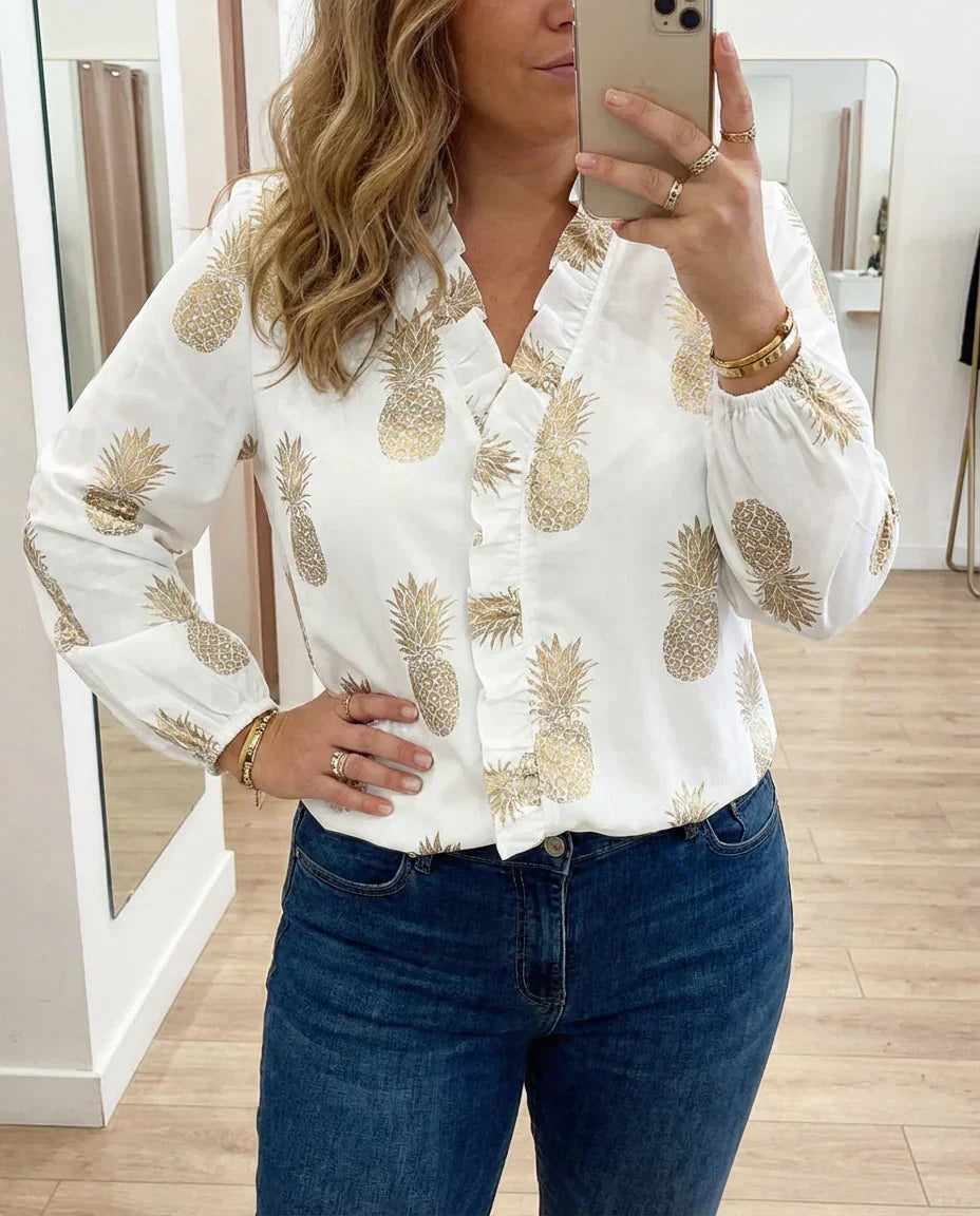 Magnolia | Feminin Blus med Lekfulla Volanger